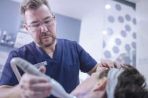 Craig Hobson delivering a SkinPen microneedling treatment