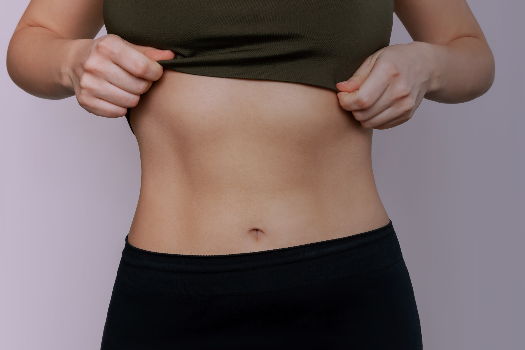 toned female torso after using Muscle stimulation technology