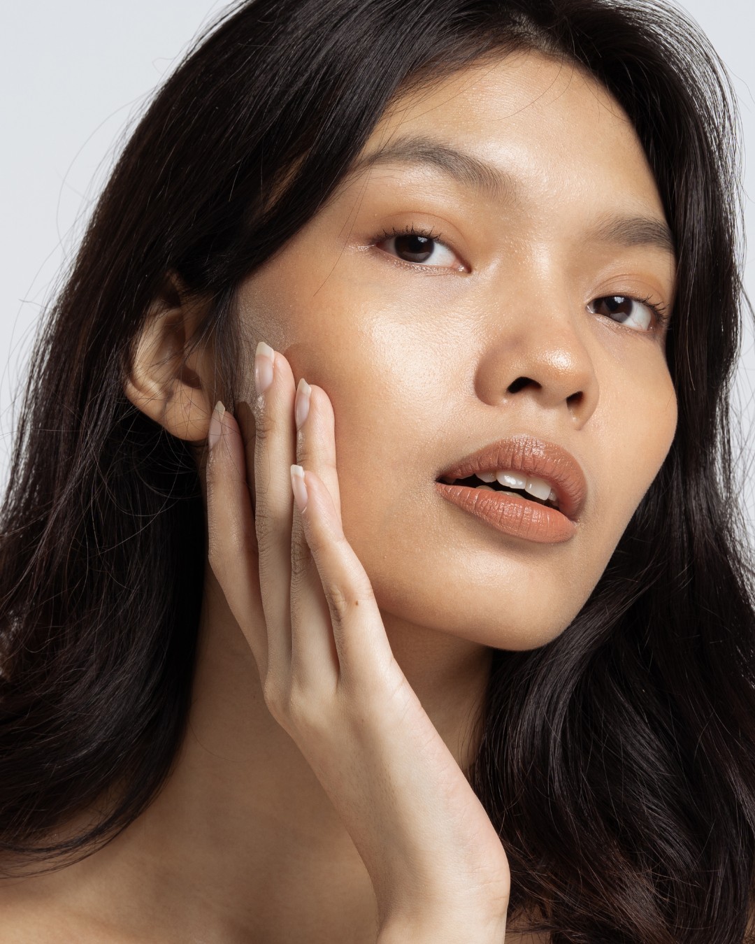 a lady with glowing skin